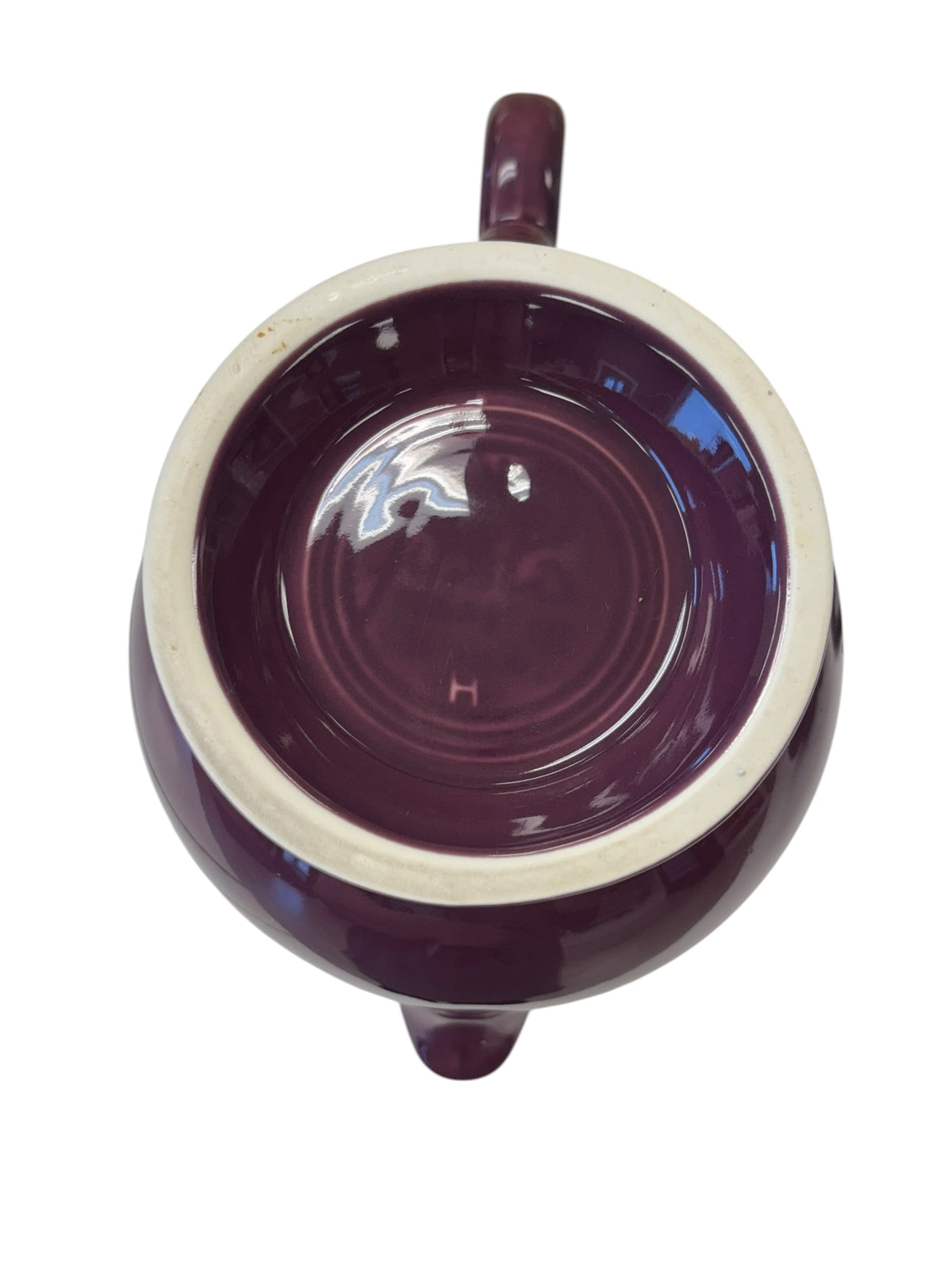 This is a Fiesta Fiestaware Five-cup 5-cup Ring Handled Tea Pot with Lid in Heather. lead-free, Post 1986, Retired Color Retired Shape
