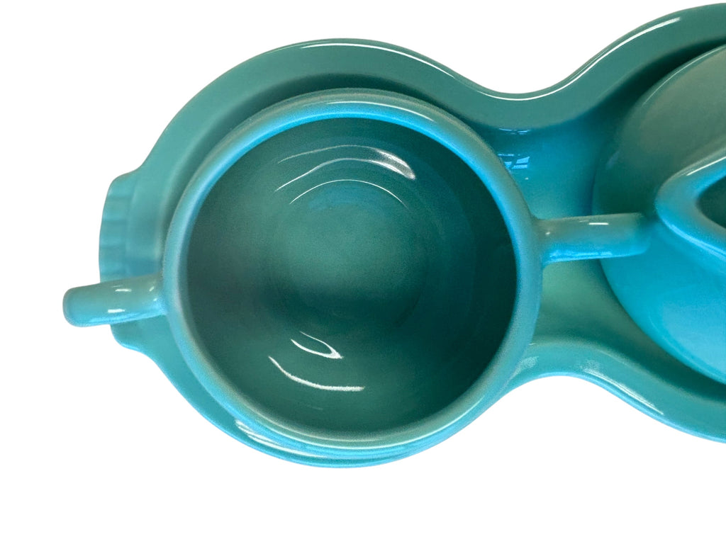 This is a Fiesta Fiestaware Creamer Pitcher Sugar Bowl with Lid on Figure Eight 8 Tray Set in Sea Mist Green. lead-free, Post 1986, Retired Color Retired Shape
