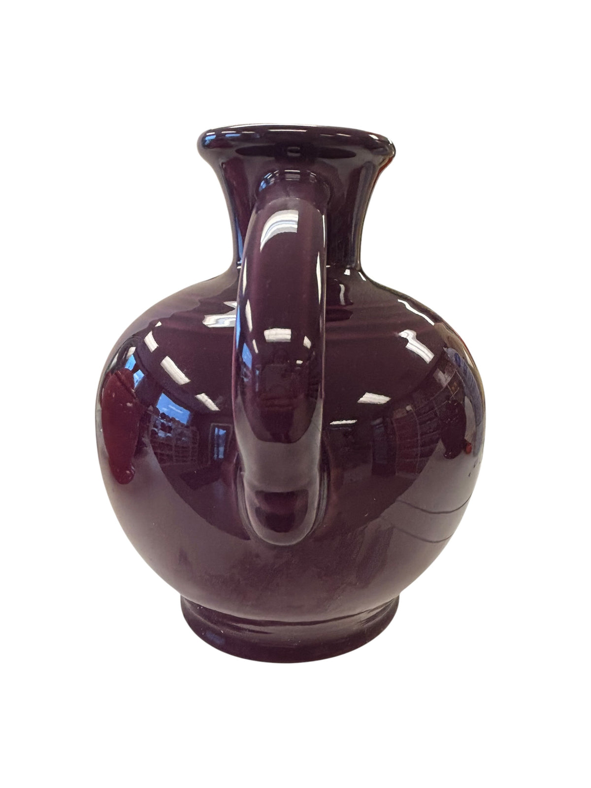 This is a Fiesta Fiestware small 60 Ounce Carafe in heather. Lead-free Post 1986 Retired color retired shape
