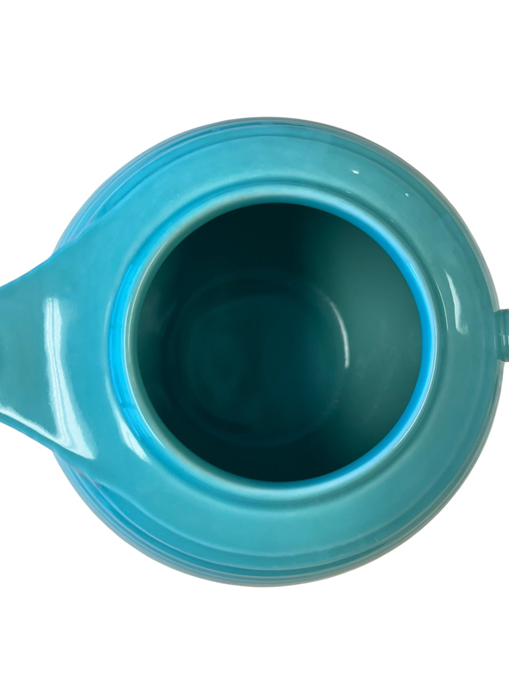 This is a Fiesta Fiestaware Five-cup 5-cup Ring Handled Tea Pot with Lid in Sea Mist Green. lead-free, Post 1986, Retired Color Retired Shape
