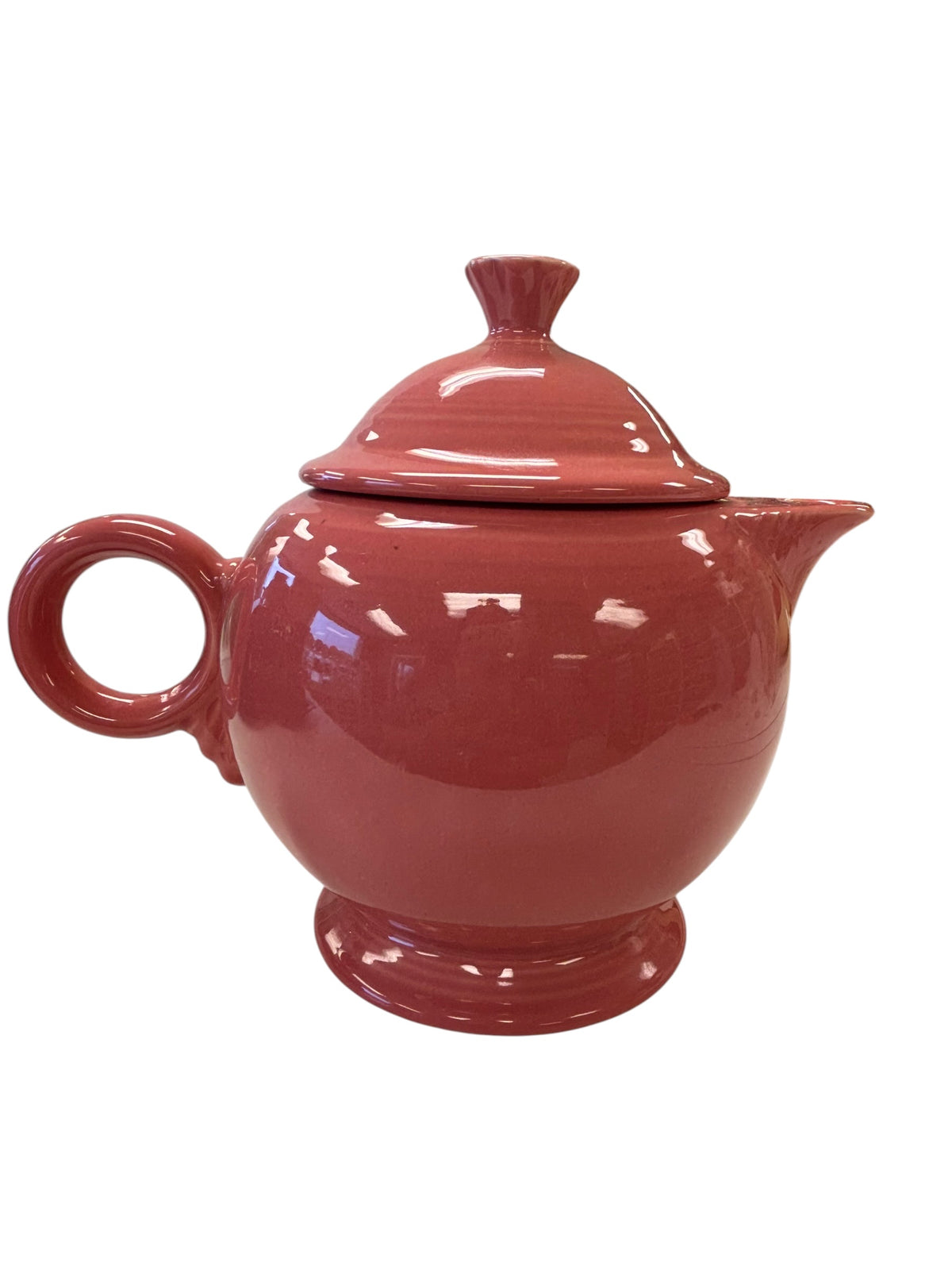 This is a Fiesta Fiestaware Five-cup 5-cup Ring Handled Tea Pot with Lid in Flamingo. lead-free, Post 1986, Retired Color Retired Shape
