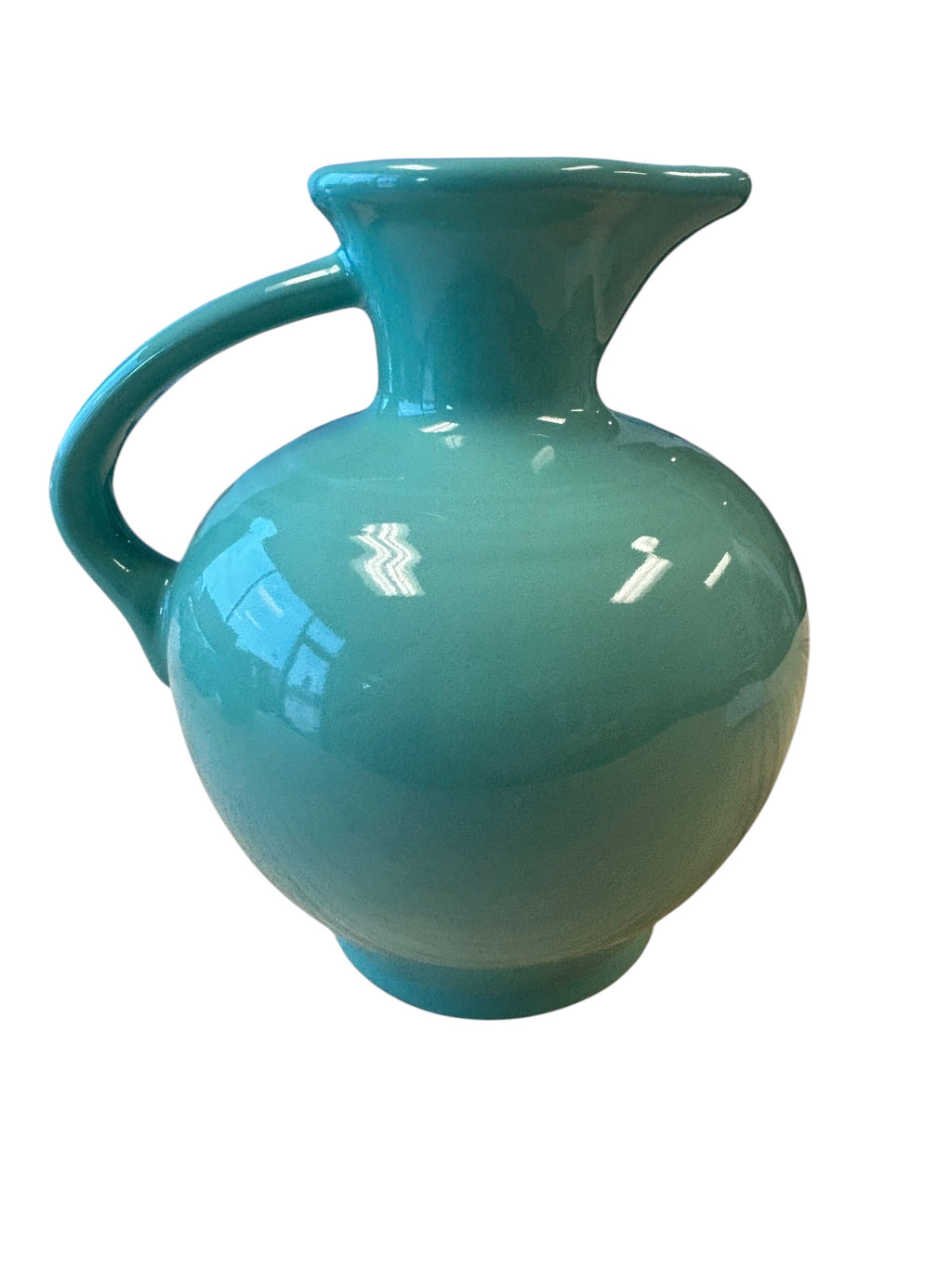 This is a Fiesta Fiestware small 60 Ounce Carafe in sea mist green. Lead-free Post 1986 Retired color retired shape
