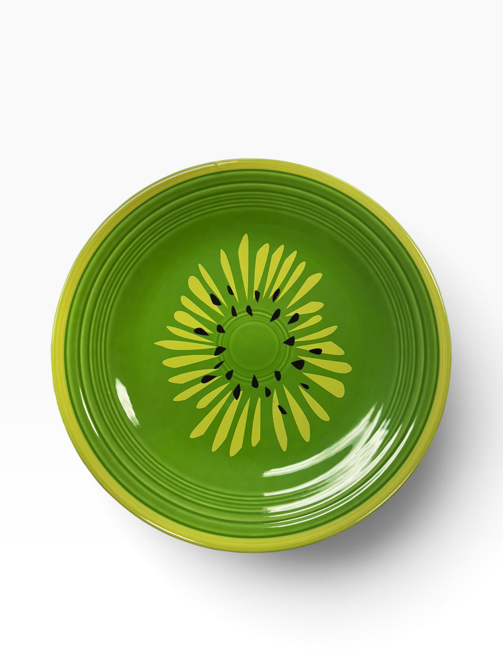 This is Fiesta fiestware Classic Dinner Plate featuring the Betty Crocker Kiwi decal on shamrock. Lead free, post 1986, retired color, retired decal, Hard to Find
