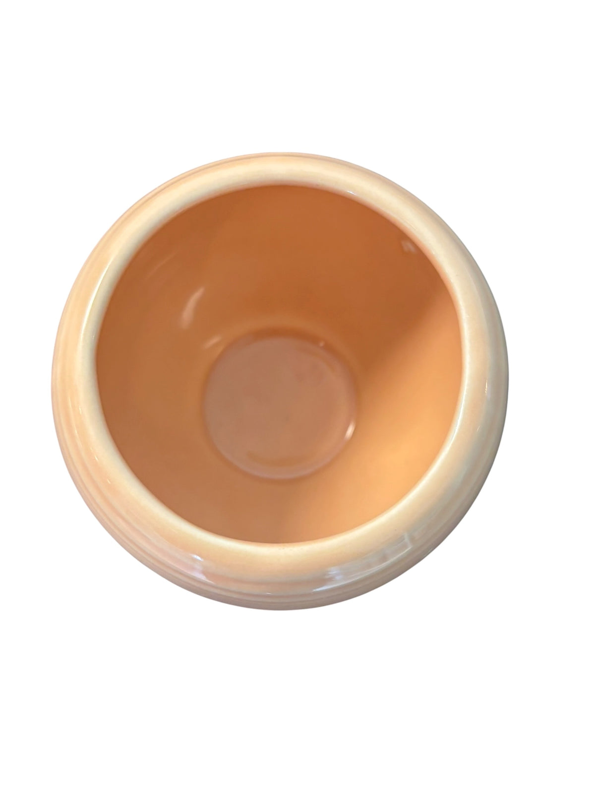 This is a Fiesta Fiestaware Individual Sugar Bowl With Lid in Apricot. lead-free, Post 1986, Retired Color Retired Shape
