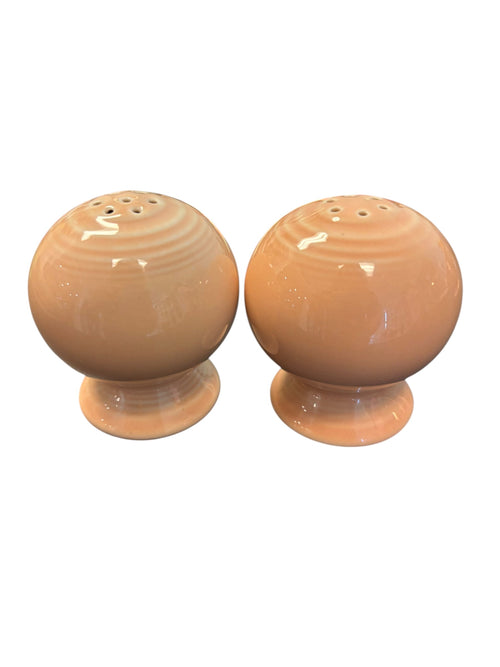 This is a Fiesta Fiestaware Bulb Shaped Salt and Pepper Shaker Set in Apricot. lead-free, Post 1986, Retired Color 