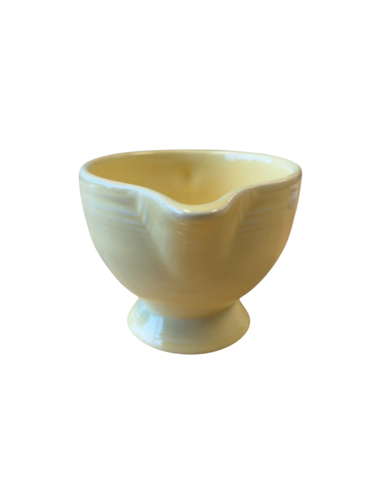This is a Fiesta Fiestaware individual cream pitcher creamer in Yellow. lead-free, Post 1986, Retired Color Retired Shape
