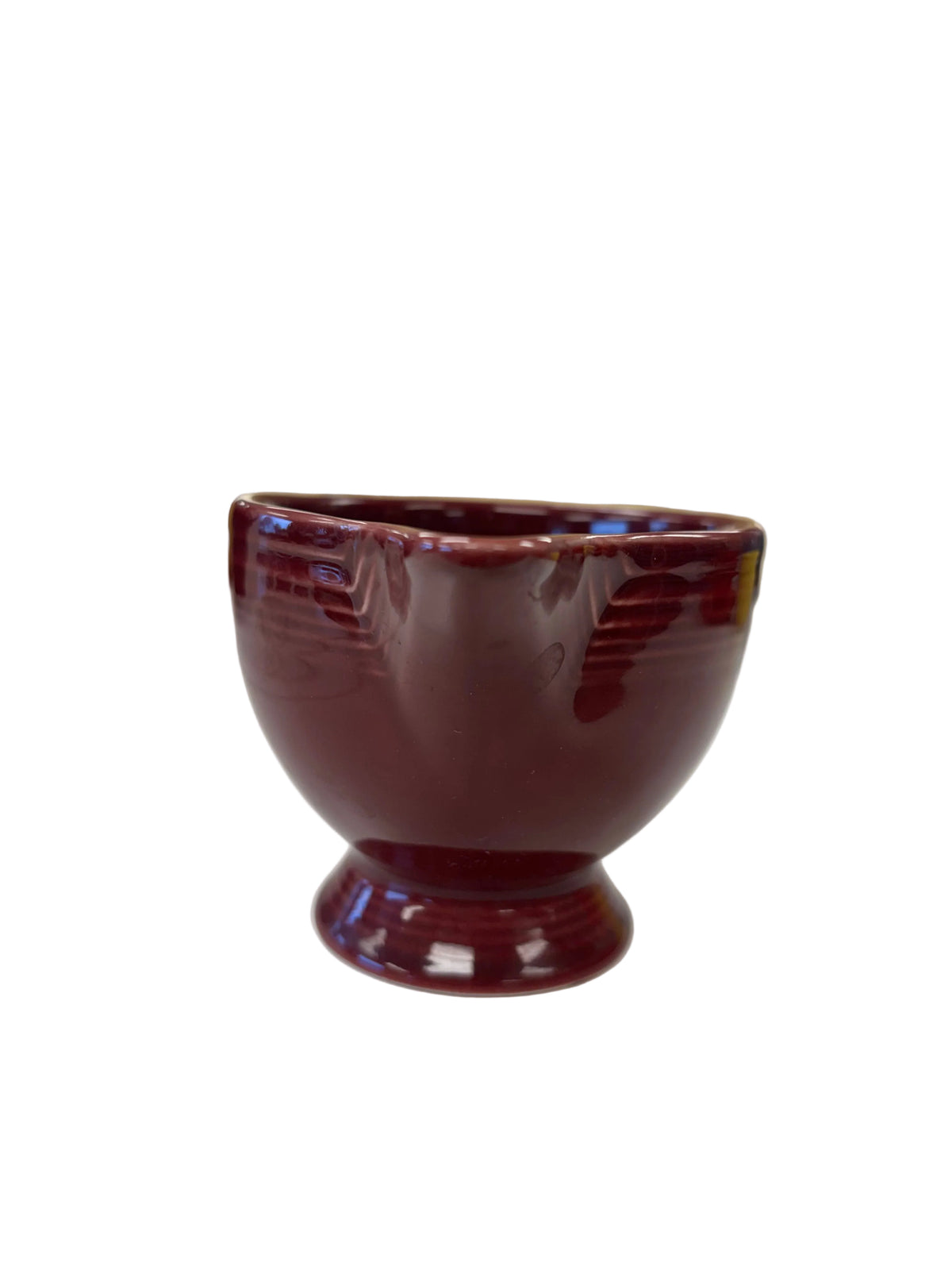 This is a Fiesta Fiestaware individual cream pitcher creamer in Cinnabar. lead-free, Post 1986, Retired Color Retired Shape
