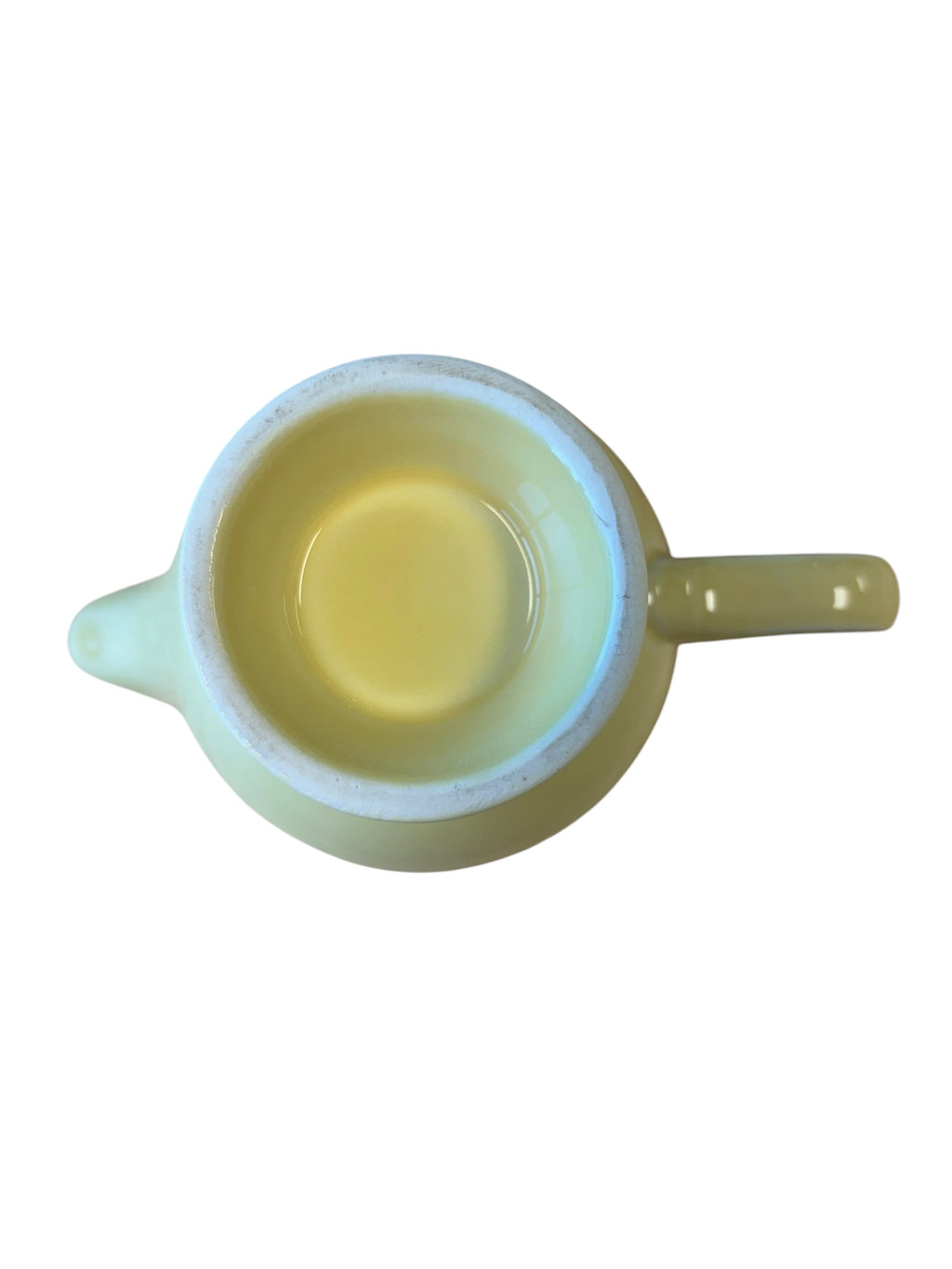 This is a Fiesta Fiestaware individual cream pitcher creamer in Yellow. lead-free, Post 1986, Retired Color Retired Shape
