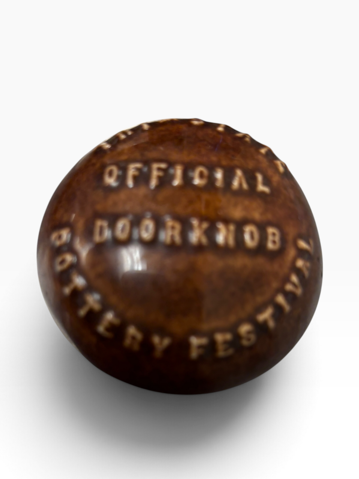 Tri-State Pottery Festival Official Doorknob in Fiesta Amberstone Amber | HLC Toss Game