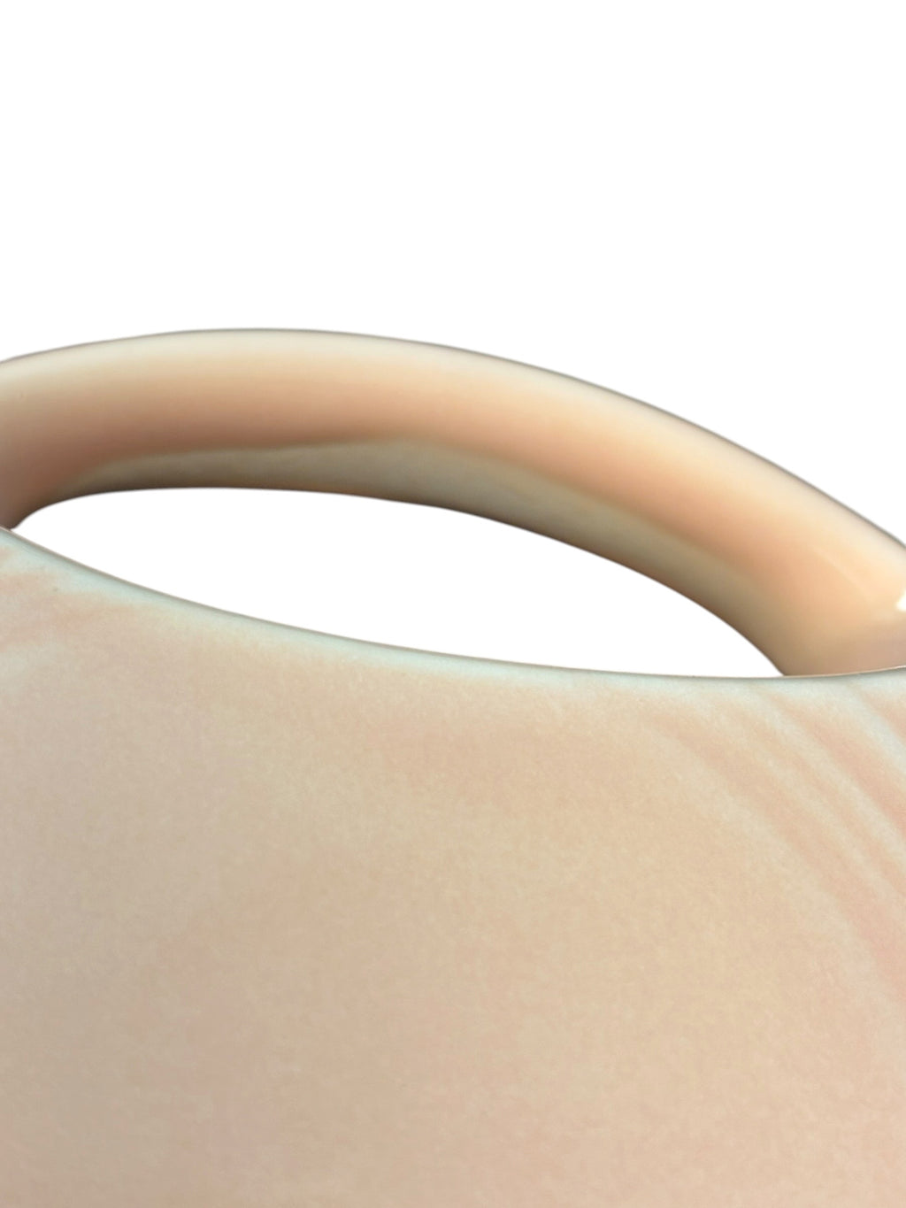 This is a Fiesta Fiestaware Small Disc Juice Pitcher in Apricot. lead-free, Post 1986, Retired Color Retired Shape 28 ounce capacity