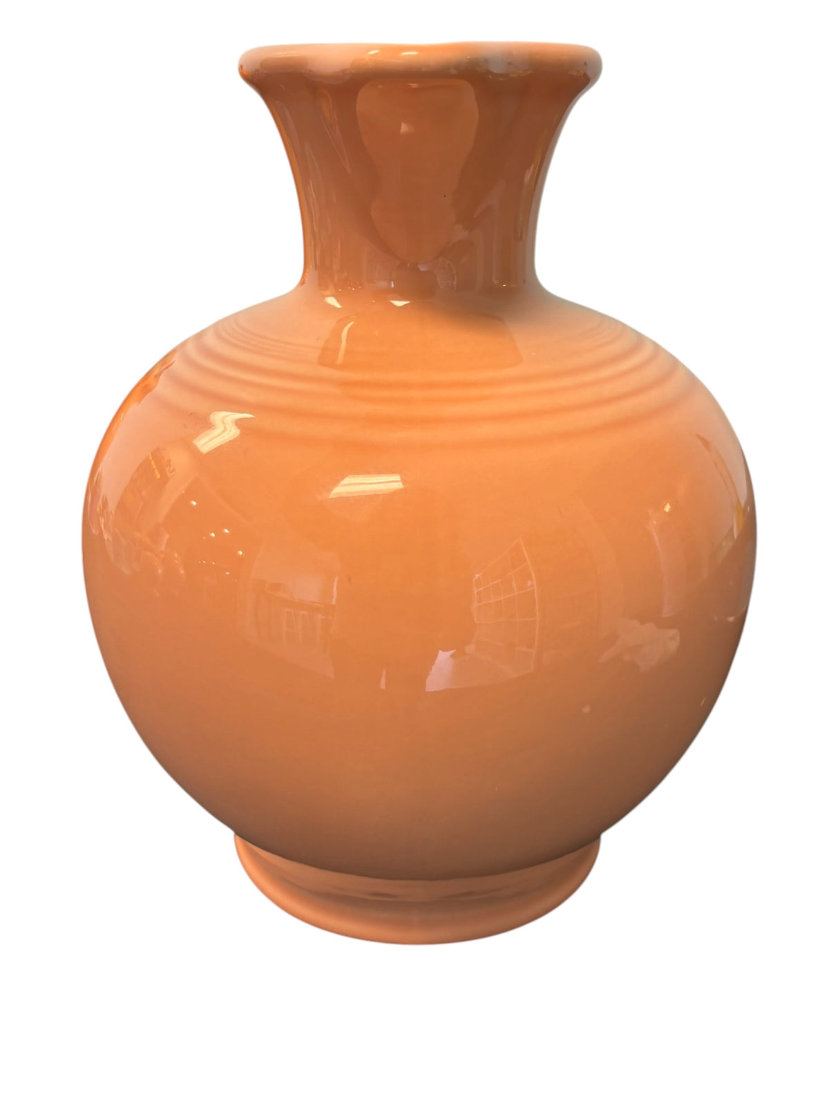 This is a Fiesta Fiestware small 60 Ounce Carafe in apricot. Lead-free Post 1986 Retired color retired shape
