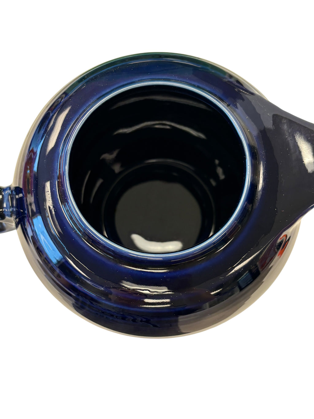 This is a Fiesta Fiestaware Five-cup 5-cup Ring Handled Tea Pot with Lid in Cobalt. lead-free, Post 1986, Retired Color Retired Shape
