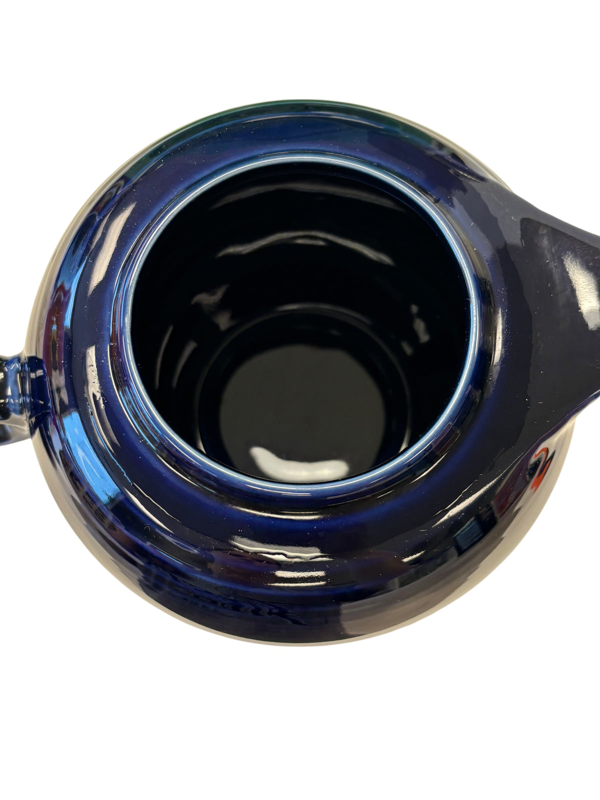 This is a Fiesta Fiestaware Five-cup 5-cup Ring Handled Tea Pot with Lid in Cobalt. lead-free, Post 1986, Retired Color Retired Shape
