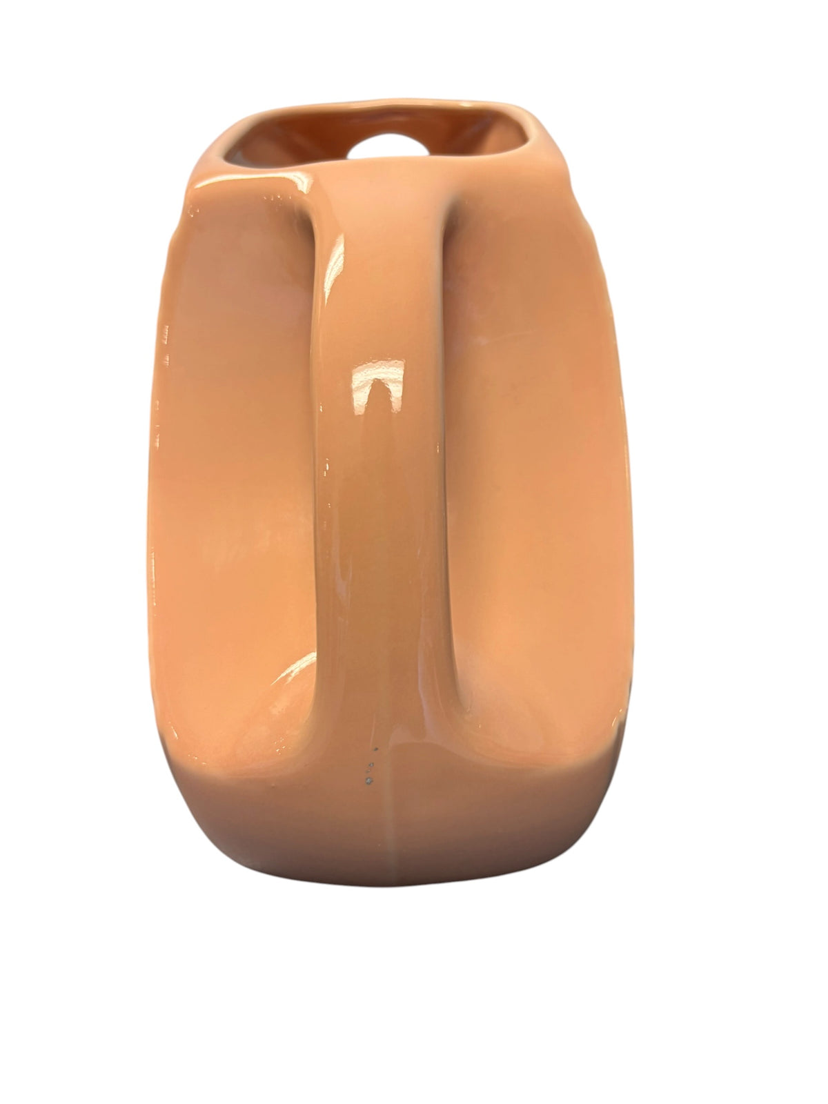 This is a Fiesta Fiestaware Large Disc Water Pitcher in Apricot. lead-free, Post 1986, Retired Color Retired Shape 67 ounce capacity
