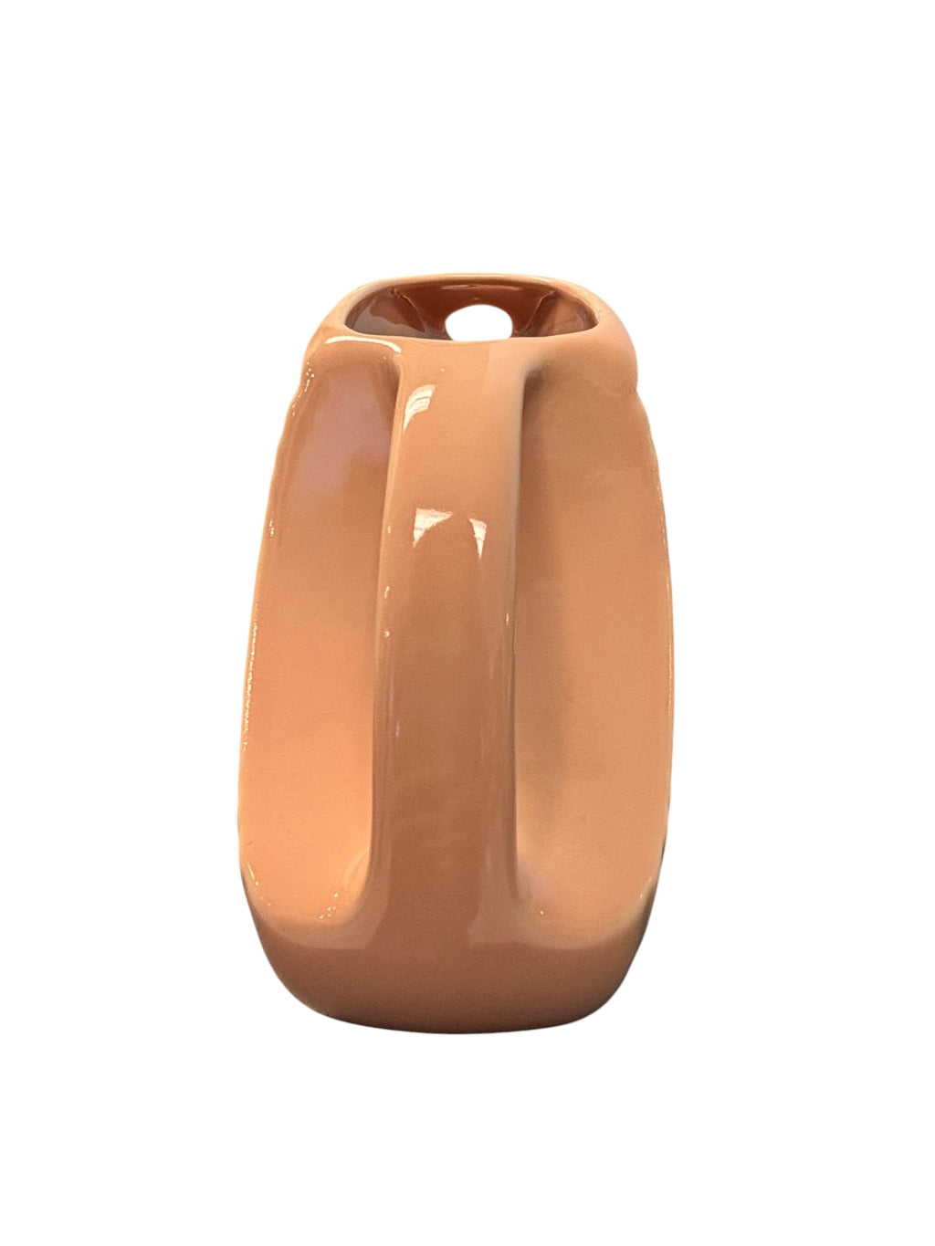 This is a Fiesta Fiestaware Small Disc Juice Pitcher in Apricot. lead-free, Post 1986, Retired Color Retired Shape 28 ounce capacity