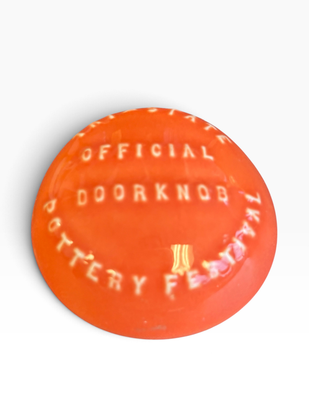 Tri-State Pottery Festival Official Doorknob in Fiesta Persimmon | HLC Toss Game