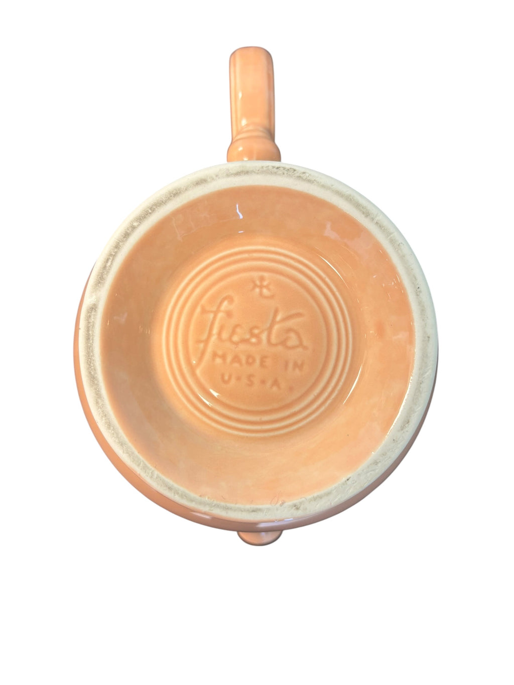 This is a Fiesta Fiestaware Five-cup 5-cup Ring Handled Tea Pot with Lid in Apricot. lead-free, Post 1986, Retired Color Retired Shape