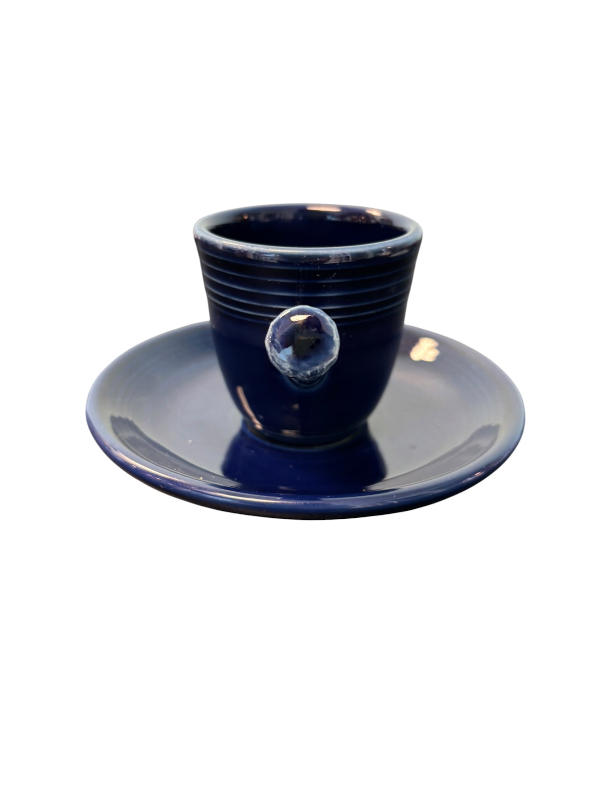 This is a Fiesta Fiestaware After Dinner AD Stick Handled Demitasse Demi Cup and Saucer Set in Cobalt. lead-free, Post 1986, Retired Color Retired Shape Perfect for Espresso

