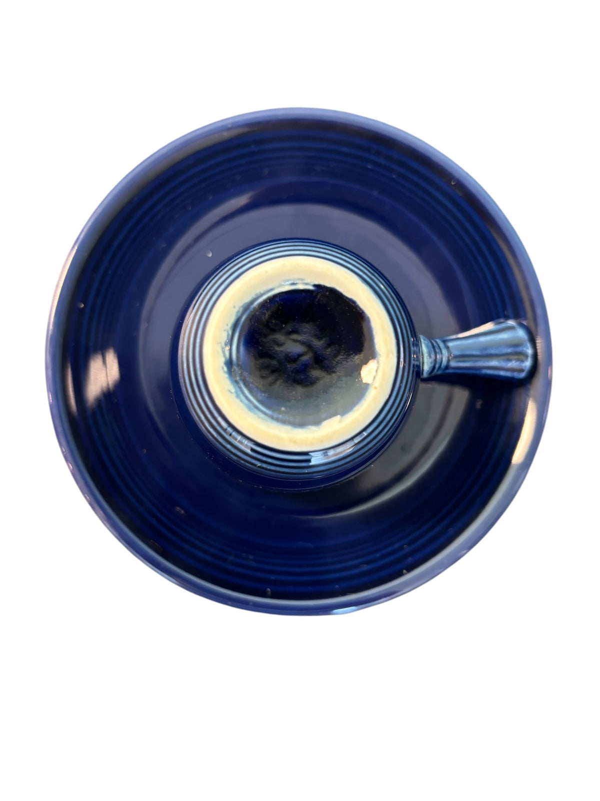 This is a Fiesta Fiestaware After Dinner AD Stick Handled Demitasse Demi Cup and Saucer Set in Cobalt. lead-free, Post 1986, Retired Color Retired Shape Perfect for Espresso
