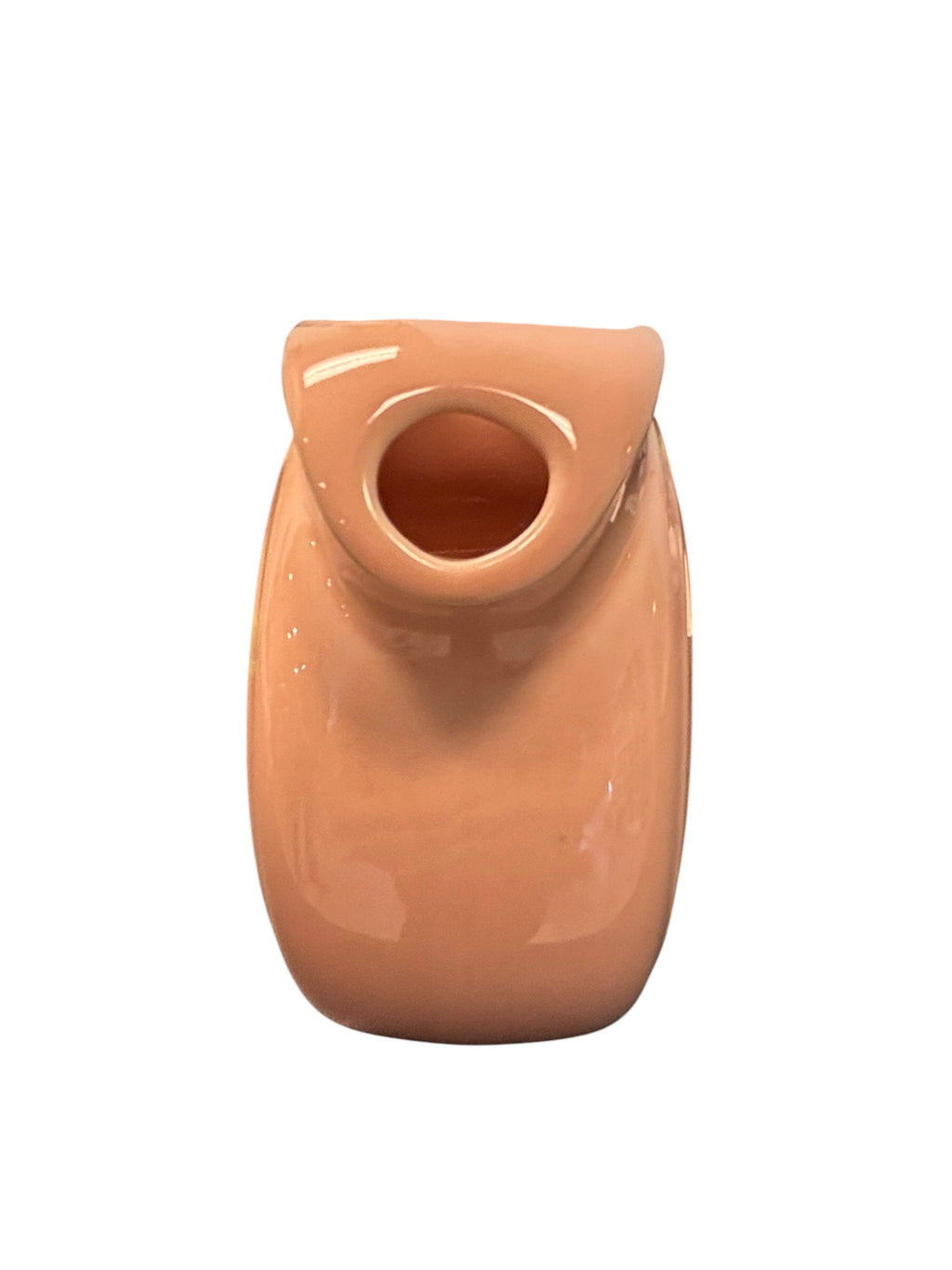 This is a Fiesta Fiestaware Small Disc Juice Pitcher in Apricot. lead-free, Post 1986, Retired Color Retired Shape 28 ounce capacity