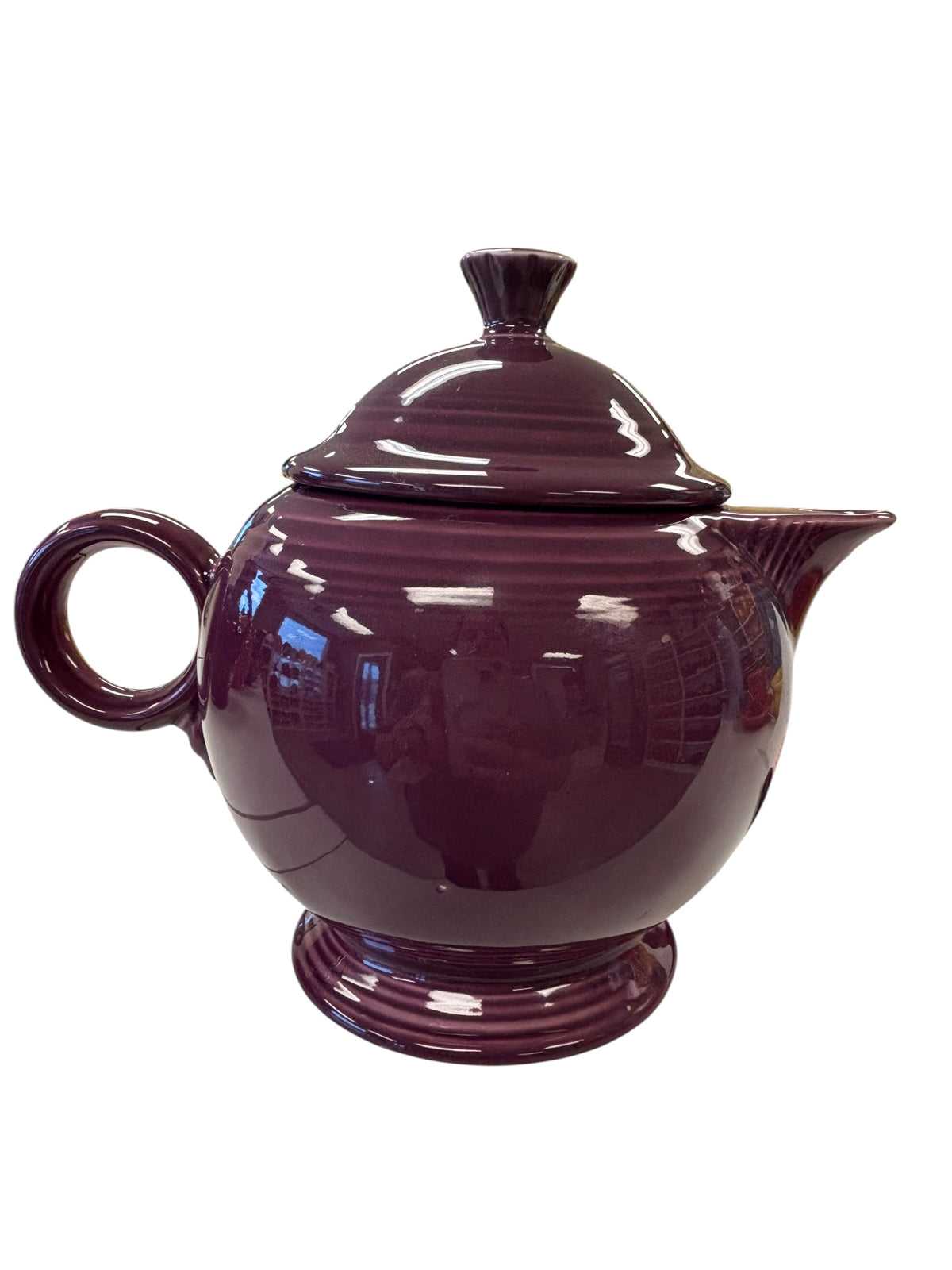 This is a Fiesta Fiestaware Five-cup 5-cup Ring Handled Tea Pot with Lid in Heather. lead-free, Post 1986, Retired Color Retired Shape
