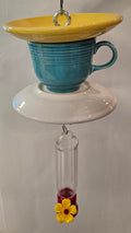 This is a handcrafted Hummingbird Feeder made from a Fiesta Fiestaware Cup and two saucers. It includes a plastic nectar holder. While not included but shown in additional pictures, these can be used to hold chimes, a windsock, or other decoration. Please see item description for specific cup and saucer color.  Crafted, Fiesta Second Life. Fiesta  Bird Feeder
