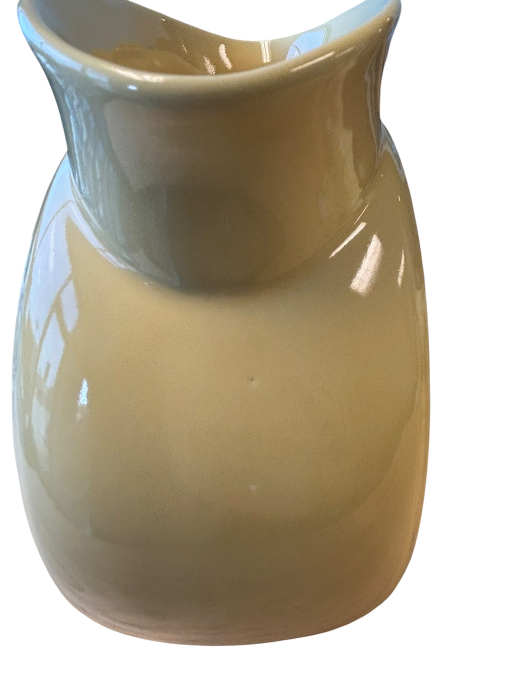 A glossy ceramic pitcher or small vase with a rounded body and flared rim, shown on a plain white background. Fiesta Millennium II Vase Sand Bumo