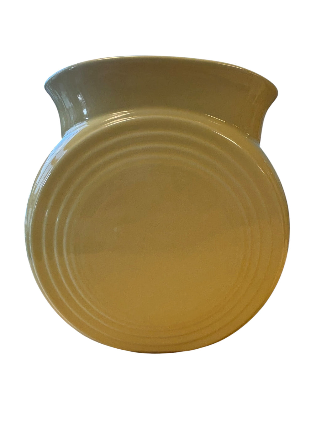 A round ceramic vase with a flared rim, featuring concentric circular ridges on the side, in a warm mustard yellow color, isolated on a white background. Fiesta Millennium II Vase in Yellow