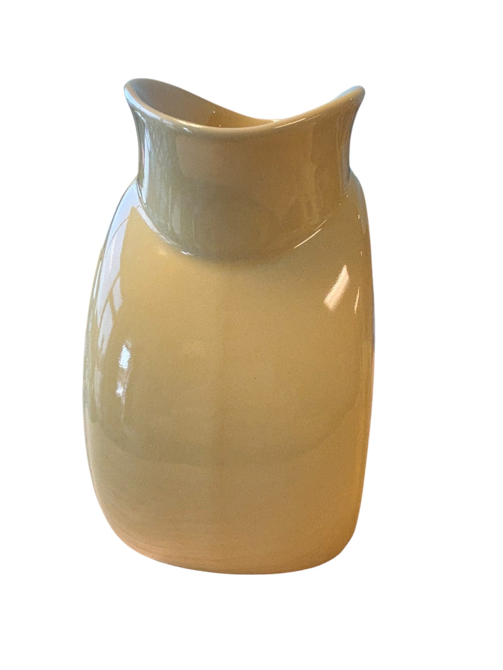 A glossy ceramic pitcher with a curved, wide rim and a rounded body, shown on a plain white background. Fiesta Millennium II Vase Side 2