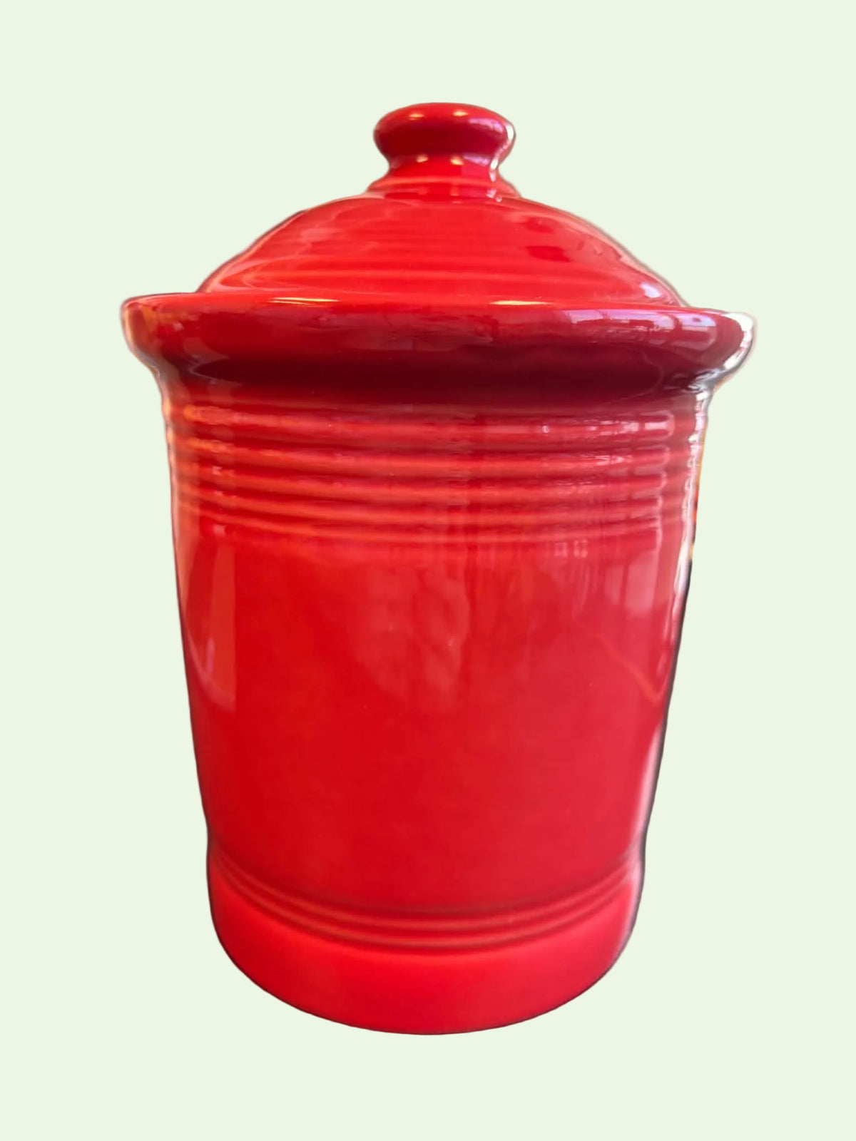 This is a Fiesta Fiestware small 1 quart classic shaped canister in scarlet. Lead-free Post 1986 Retired Shape
