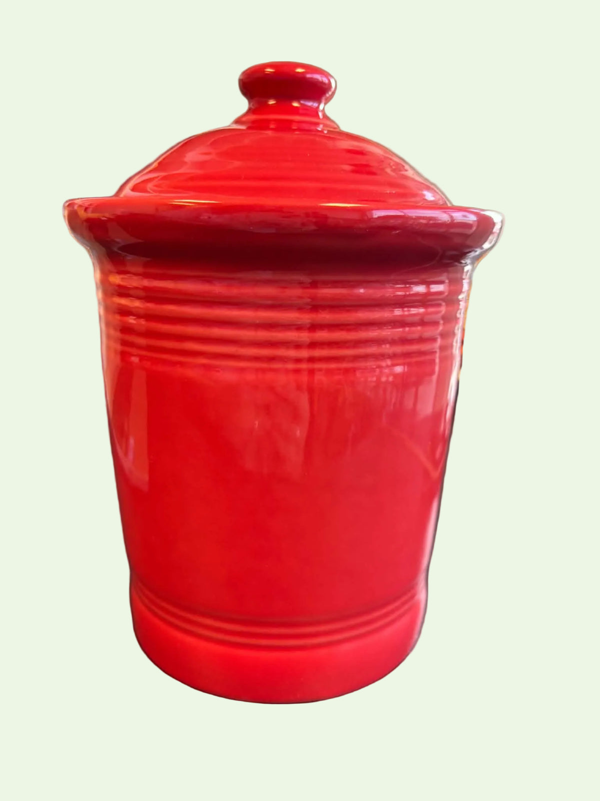 This is a Fiesta Fiestware small 1 quart classic shaped canister in scarlet. Lead-free Post 1986 Retired Shape
