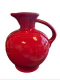 This is a Fiesta Fiestware small 60 Ounce Carafe in scarlet. Lead-free Post 1986 retired shape
