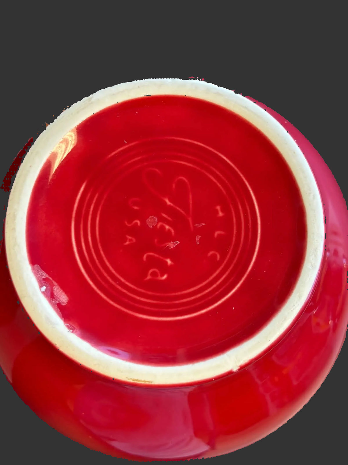 This is a Fiesta Fiestware small 60 Ounce Carafe in scarlet. Lead-free Post 1986 retired shape
