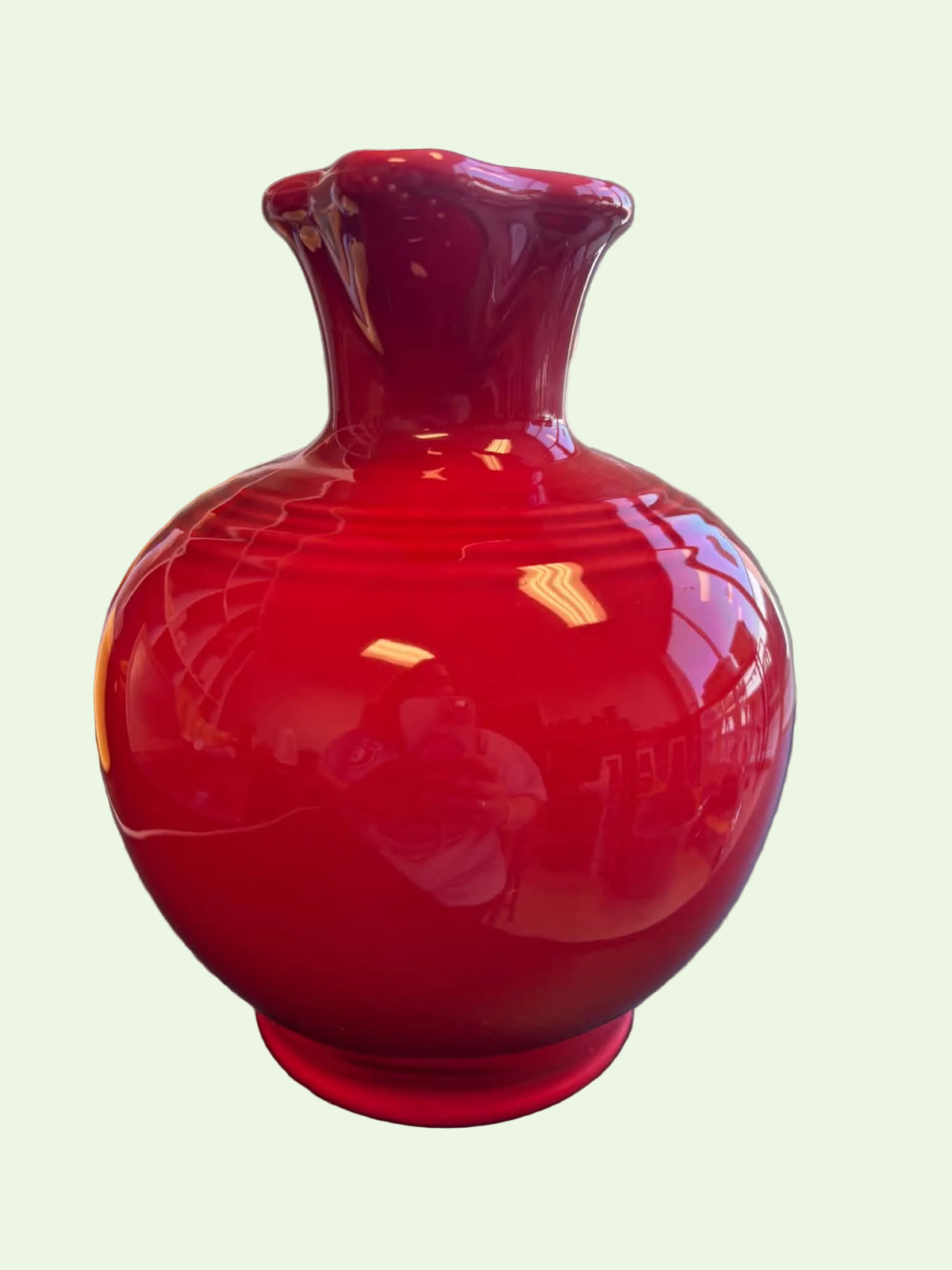 This is a Fiesta Fiestware small 60 Ounce Carafe in scarlet. Lead-free Post 1986 retired shape
