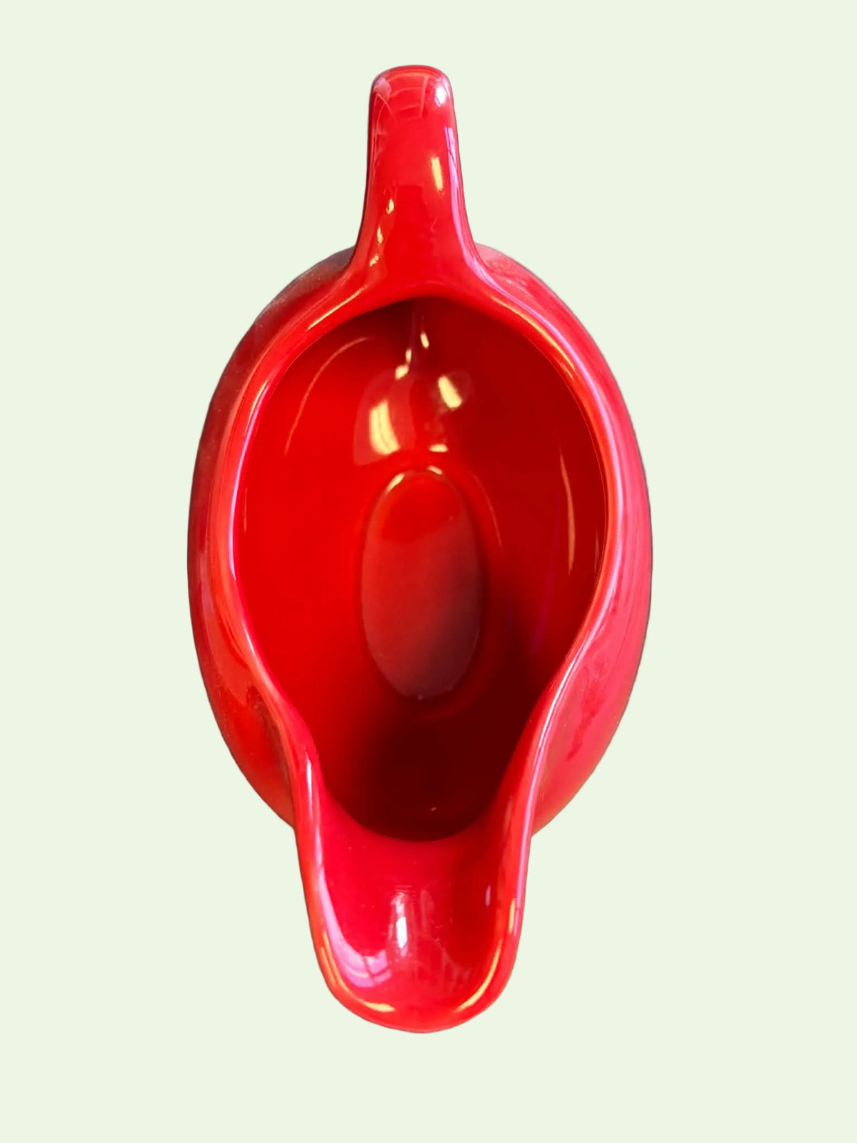 This is a Fiesta Fiestaware Sauce Gravy Boat in Scarlet. lead-free, Post 1986
