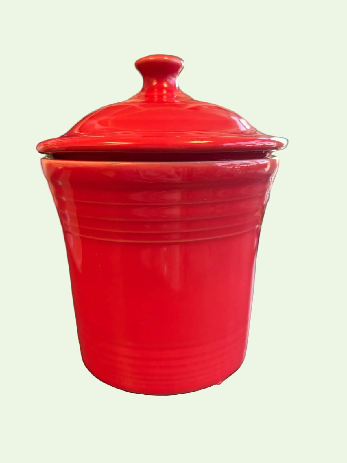 This is a Fiesta Fiestaware Jam Jar or Mini Canister with lid in peony. lead-free, Post 1986, Retired Shape
