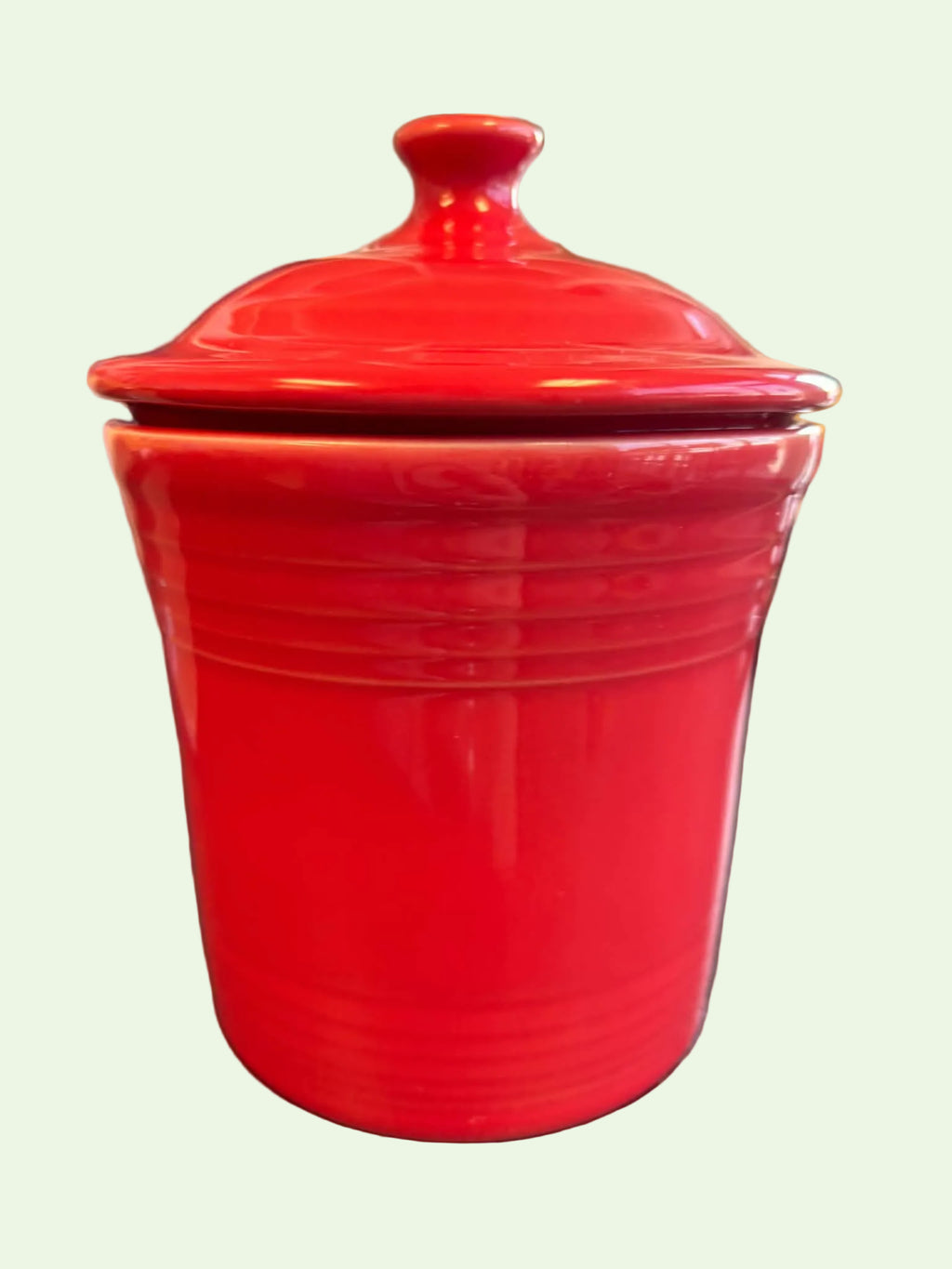 This is a Fiesta Fiestaware Jam Jar or Mini Canister with lid in peony. lead-free, Post 1986, Retired Shape
