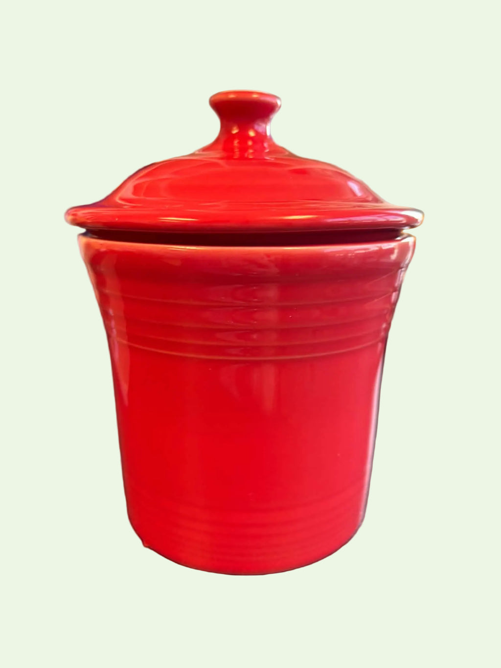 This is a Fiesta Fiestaware Jam Jar or Mini Canister with lid in peony. lead-free, Post 1986, Retired Shape
