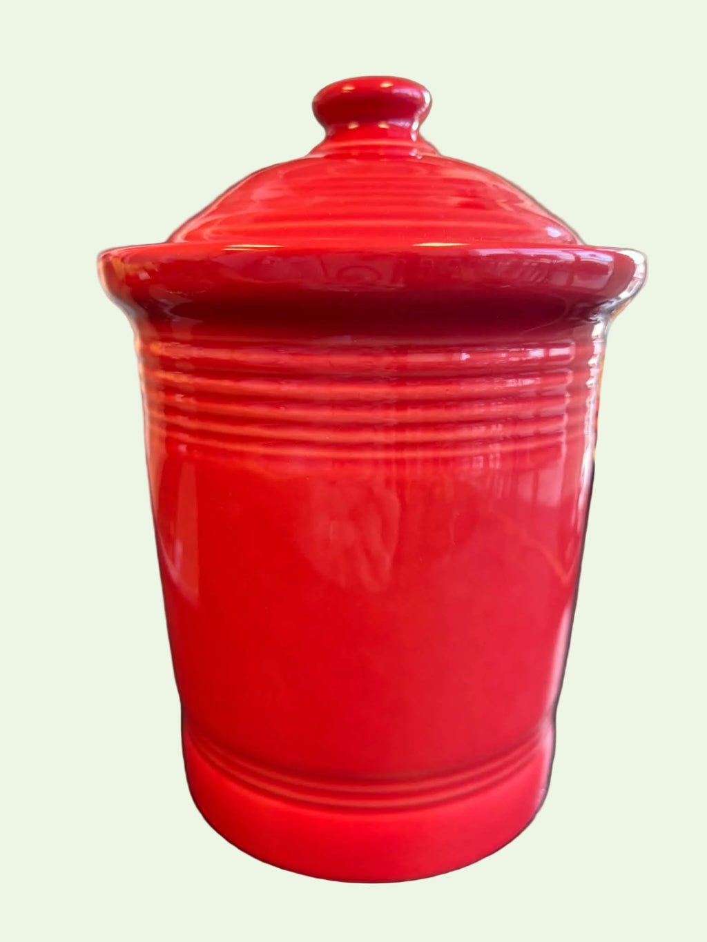 This is a Fiesta Fiestware small 1 quart classic shaped canister in scarlet. Lead-free Post 1986 Retired Shape
