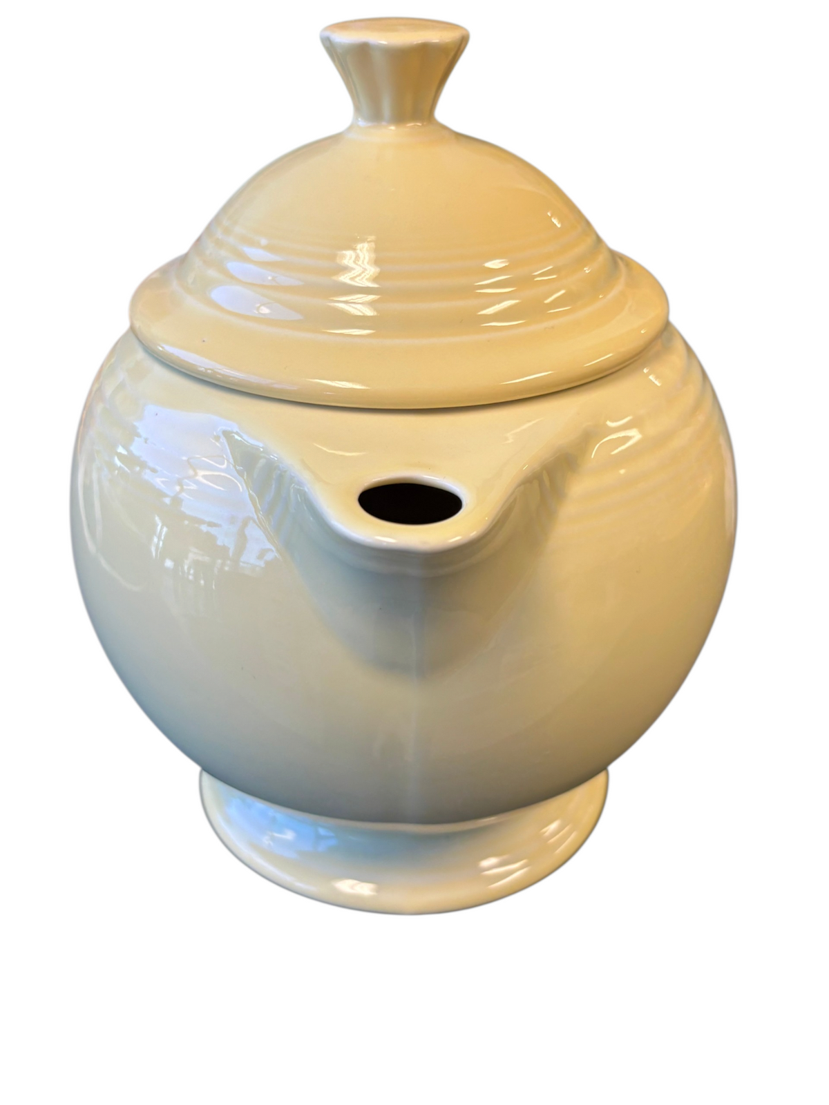 This is a Fiesta Fiestaware Five-cup 5-cup Ring Handled Tea Pot with Lid in Yellow. lead-free, Post 1986, Retired Color Retired Shape
