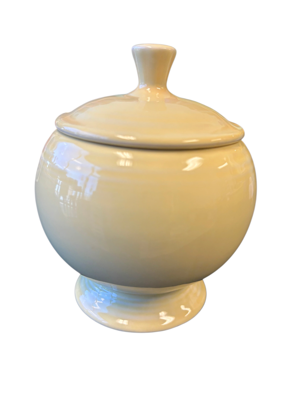 This is a Fiesta Fiestaware Individual Sugar Bowl With Lid in Yellow. lead-free, Post 1986, Retired Color Retired Shape
