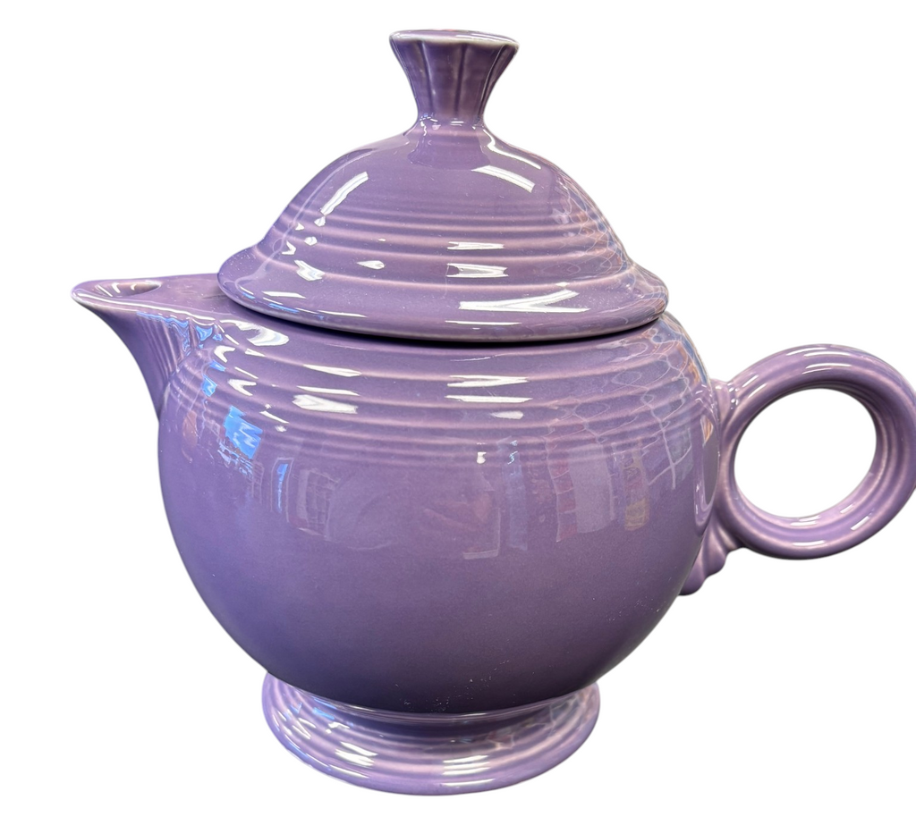 This is a Fiesta Fiestaware Five-cup 5-cup Ring Handled Tea Pot with Lid in Lilac. lead-free, Post 1986, Retired Color Retired Shape
