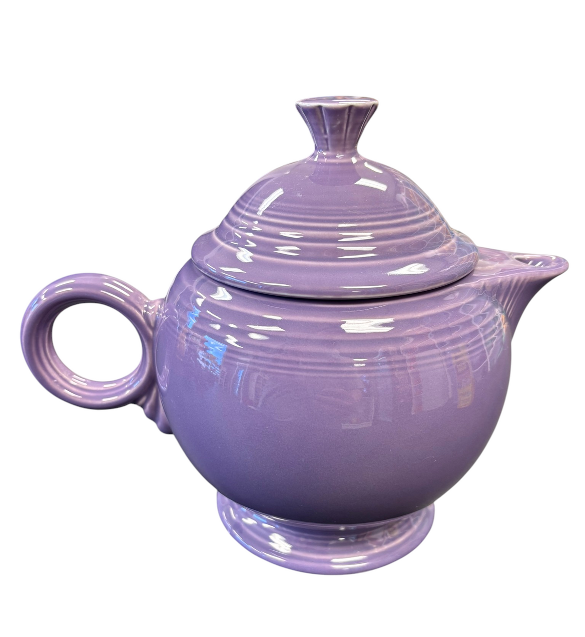 This is a Fiesta Fiestaware Five-cup 5-cup Ring Handled Tea Pot with Lid in Lilac. lead-free, Post 1986, Retired Color Retired Shape
