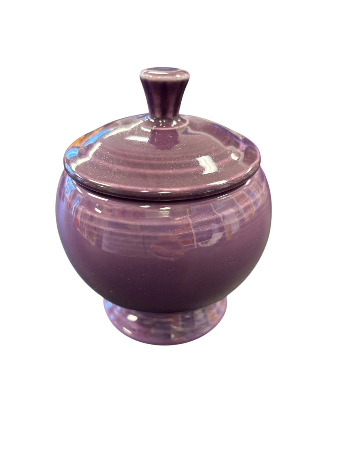 This is a Fiesta Fiestaware Individual Sugar Bowl With Lid in Mulberry. lead-free, Post 1986, Retired Color Retired Shape
