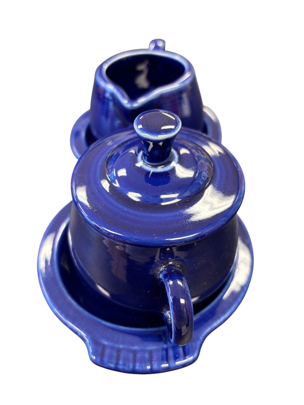 This is a Fiesta Fiestaware Creamer Pitcher Sugar Bowl with Lid on Figure Eight 8 Tray Set in twilight lead-free, Post 1986, Retired Color Retired Shape
