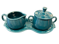 This is a Fiesta Fiestaware Creamer Pitcher Sugar Bowl with Lid on Figure Eight 8 Tray Set in juniper lead-free, Post 1986, Retired Color Retired Shape
