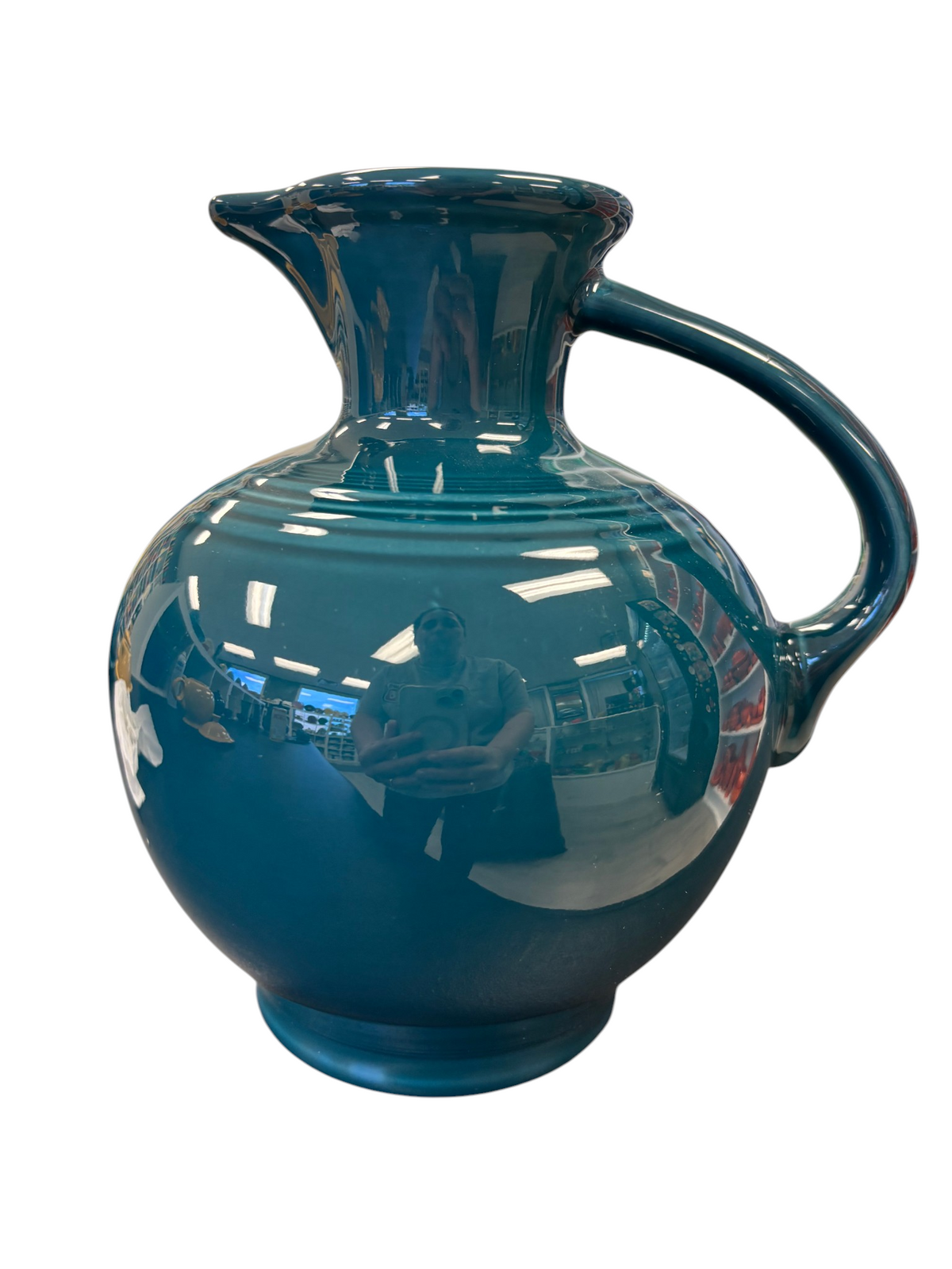 This is a Fiesta Fiestware small 60 Ounce Carafe in juniper. Lead-free Post 1986 Retired color retired shape
