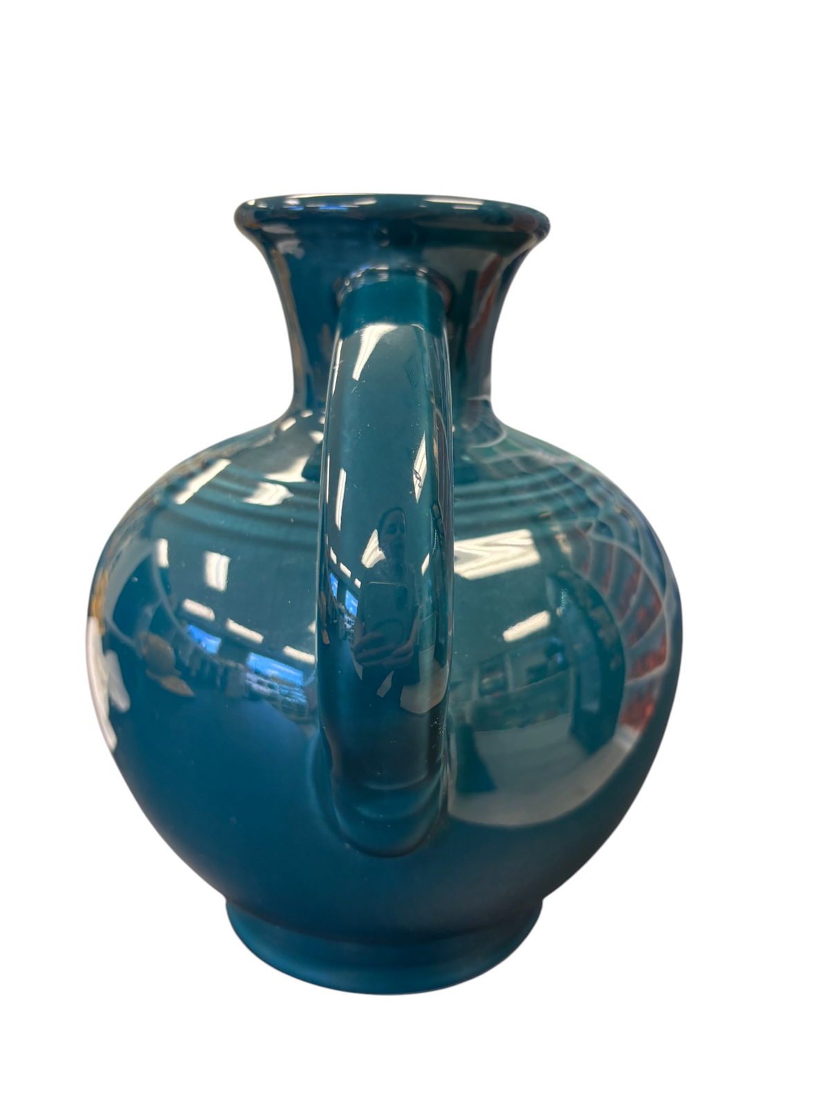 This is a Fiesta Fiestware small 60 Ounce Carafe in juniper. Lead-free Post 1986 Retired color retired shape
