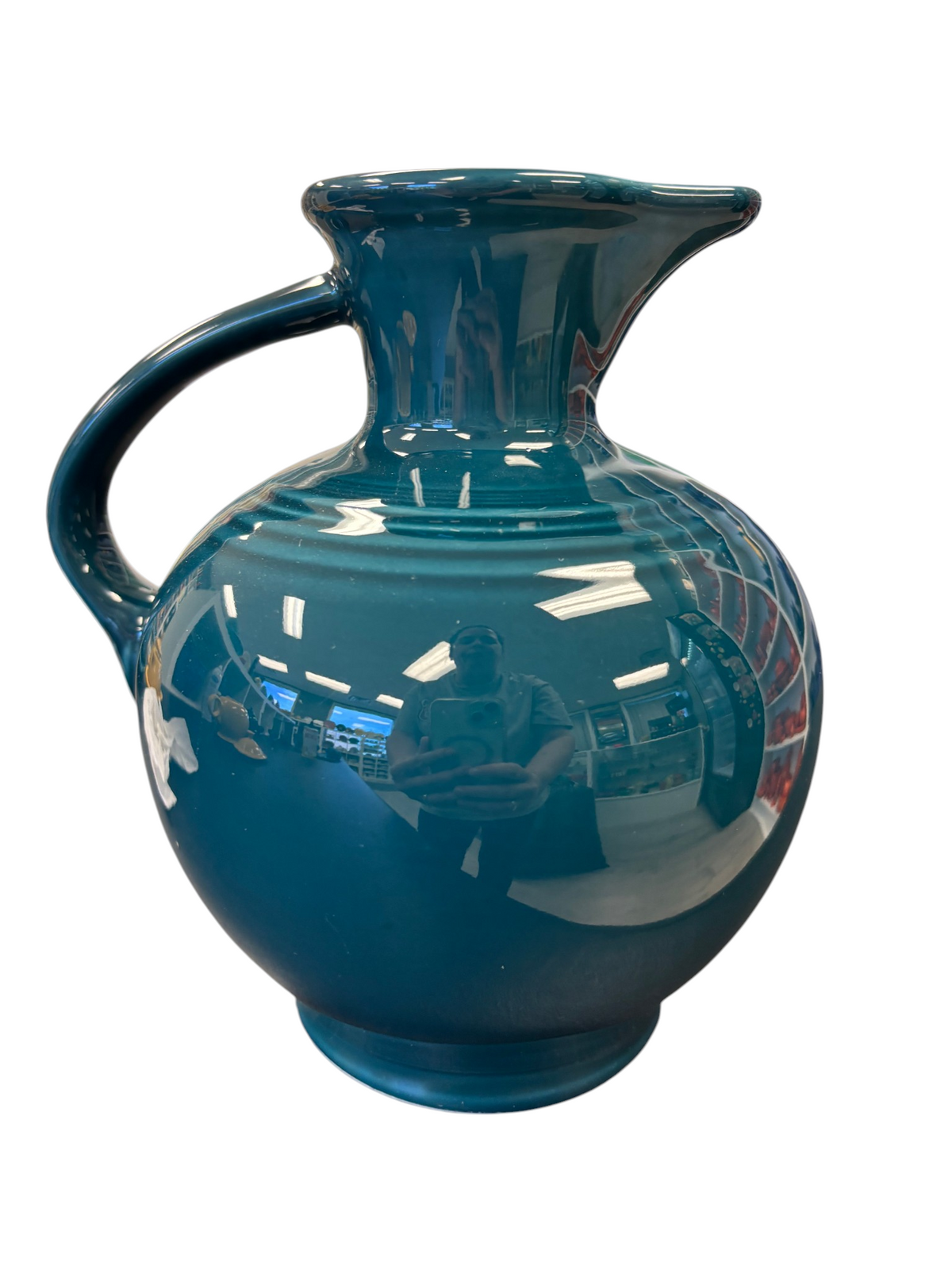 This is a Fiesta Fiestware small 60 Ounce Carafe in juniper. Lead-free Post 1986 Retired color retired shape
