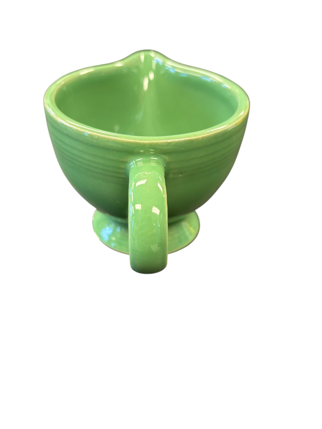 This is a Fiesta Fiestaware individual cream pitcher creamer in Meadow. lead-free, Post 1986, Retired Shape
